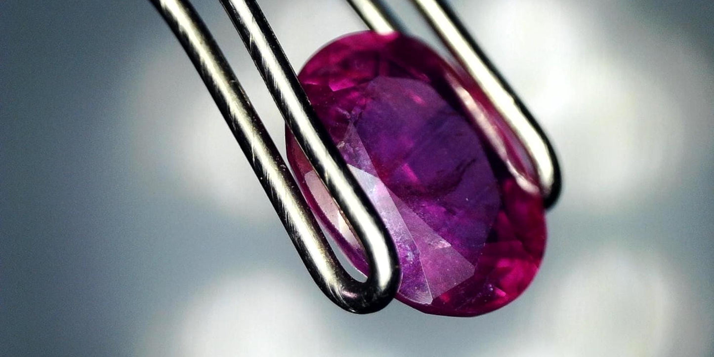 Captivating 0.76ct Oval Transparent Heated Natural Red Ruby: GIA Report #6204534789