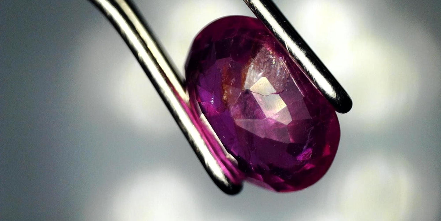 Captivating 0.76ct Oval Transparent Heated Natural Red Ruby: GIA Report #6204534789