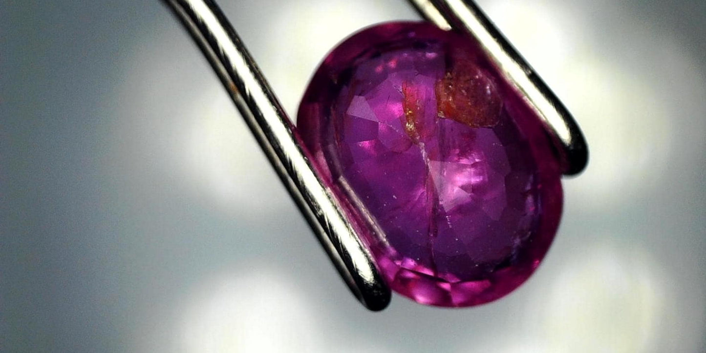 Captivating 0.76ct Oval Transparent Heated Natural Red Ruby: GIA Report #6204534789