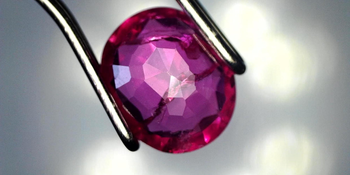 Captivating 0.81ct Oval Transparent Heated (Minor Residues) Natural Red Ruby: GIA Report #6203534776