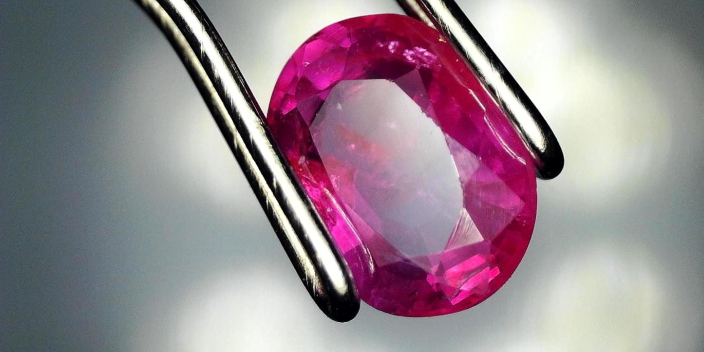 Captivating 0.76ct Oval Transparent Heated Natural Red Ruby: GIA Report #6204534789