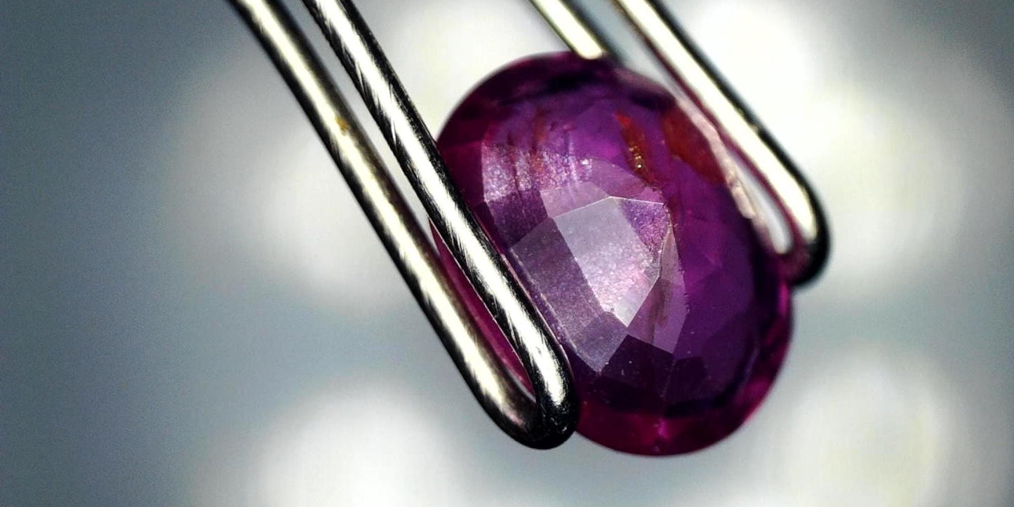 Captivating 0.76ct Oval Transparent Heated Natural Red Ruby: GIA Report #6204534789