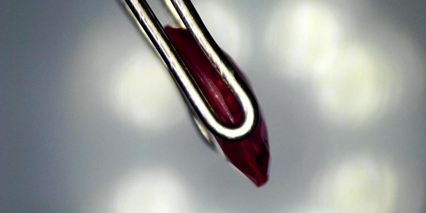 Captivating 0.81ct Oval Transparent Heated (Minor Residues) Natural Red Ruby: GIA Report #6203534776