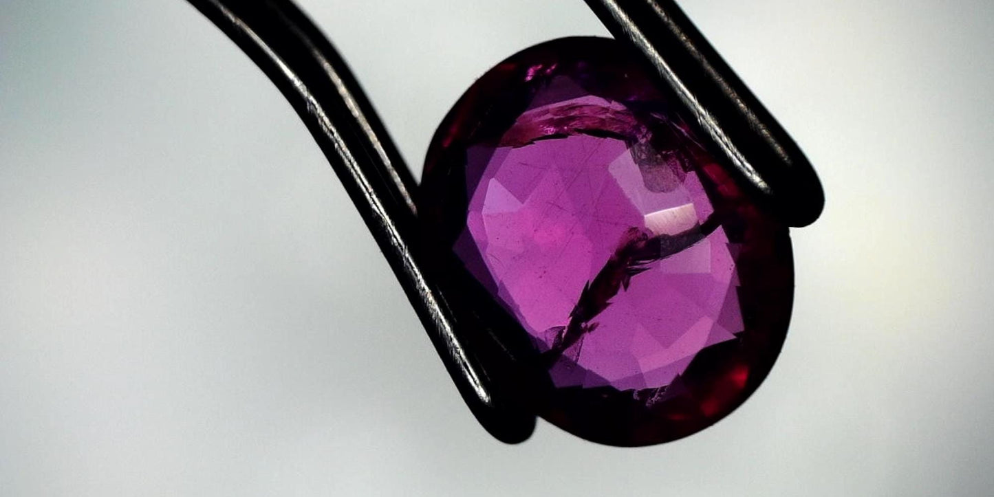 Captivating 0.81ct Oval Transparent Heated (Minor Residues) Natural Red Ruby: GIA Report #6203534776