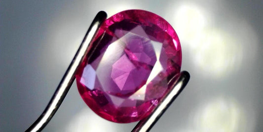 Captivating 0.81ct Oval Transparent Heated (Minor Residues) Natural Red Ruby: GIA Report #6203534776